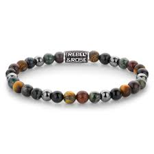 Modelnaam	Stormy Weather Vintage - 6mm
Modelnr.	RR-60128-V-M
Collectie	Bracelets Beads
Type sieraad	Armband
Kleur	Mix
Sluiting	Stainless Steel
Materiaal	Edelstenen
Steensoort	Tiger Eye Blue, Tiger Eye Yellow, Brecciated Jasper, Ryolite, Hematite Grey
Steenkleur	Multi-kleuren
Afwerking	Mat
Breedte (mm)	6mm
Garantie	6 maanden